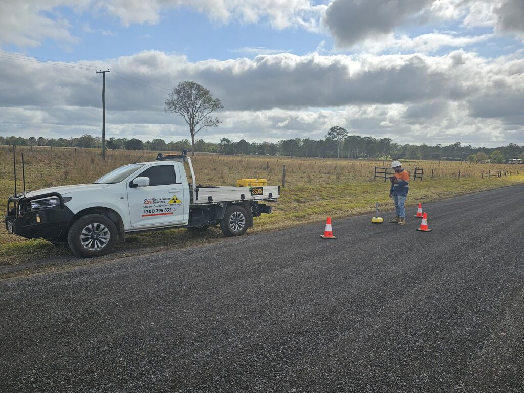 Geotechnical Services technician performing field density for the Gympie DFRA project